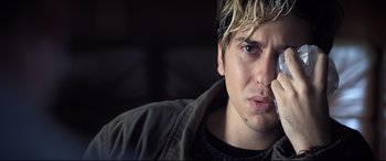 Movie still from “Death Note” (2017), directed by Adam Wingard – A person wearing a jacket; Close Up shot, Over the shoulder angle