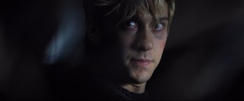 Movie still from “Death Note” (2017), directed by Adam Wingard – A young man's face in the dark; Close Up shot, Low angle