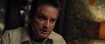 Movie still from “Death Note” (2017), directed by Adam Wingard – A person wearing a white shirt; Close Up shot, Over the shoulder angle