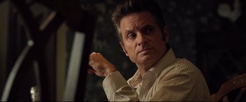 Movie still from “Death Note” (2017), directed by Adam Wingard – A person wearing a dress shirt; Close Up shot, Over the shoulder angle