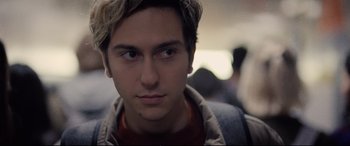 Movie still from “Death Note” (2017), directed by Adam Wingard – A young man's face as he sits on a bus; Close Up shot, Over the shoulder angle