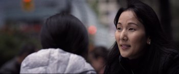 Movie still from “Death Note” (2017), directed by Adam Wingard – A person smiling at the camera; Close Up shot, Over the shoulder angle