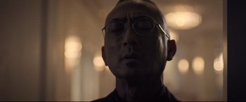 Movie still from “Death Note” (2017), directed by Adam Wingard – A person wearing glasses with his eyes closed; Close Up shot, Low angle