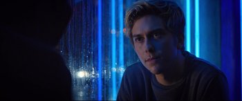 Movie still from “Death Note” (2017), directed by Adam Wingard – A young man sitting in front of a rain covered window; Close Up shot, Over the shoulder angle