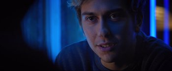 Movie still from “Death Note” (2017), directed by Adam Wingard – A young man's face at night; Close Up shot, Over the shoulder angle