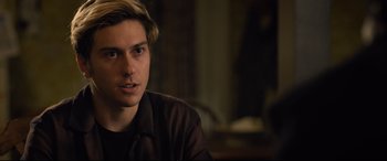 Movie still from “Death Note” (2017), directed by Adam Wingard – A man sitting in front of a mirror in a dark room; Close Up shot, Over the shoulder angle