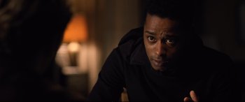 Movie still from “Death Note” (2017), directed by Adam Wingard – A person with his eyes wide open; Close Up shot, Over the shoulder angle