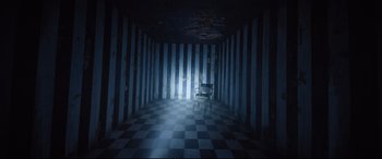 Movie still from “Death Note” (2017), directed by Adam Wingard – An empty chair in a dark room with a checkered floor; Extreme Wide shot, High angle