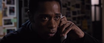 Movie still from “Death Note” (2017), directed by Adam Wingard – A person talking on a phone; Close Up shot, High angle