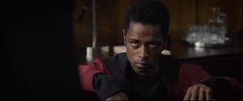 Movie still from “Death Note” (2017), directed by Adam Wingard – A young man sitting in a chair looking at the camera; Close Up shot, Over the shoulder angle