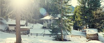 Movie still from “Clouds of Sils Maria” (2014), directed by Olivier Assayas – A house in the middle of a snowy forest; Extreme Wide shot, High angle