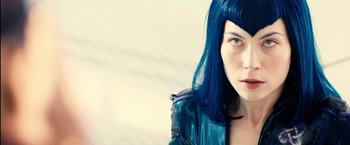 Movie still from “Clouds of Sils Maria” (2014), directed by Olivier Assayas – A person with blue hair; Close Up shot, Low angle