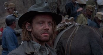 Movie still from “Coal Miner's Daughter” (1980), directed by Michael Apted – A person wearing a hat; Close Up shot, Low angle