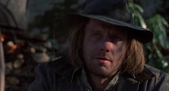 Movie still from “Coal Miner's Daughter” (1980), directed by Michael Apted – A person wearing a hat; Close Up shot, Low angle