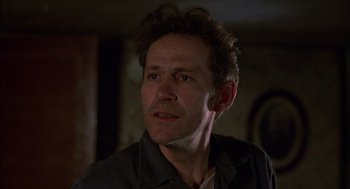 Movie still from “Coal Miner's Daughter” (1980), directed by Michael Apted – A person wearing a black shirt; Close Up shot, Low angle