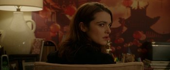 Movie still from “Constantine” (2005), directed by Francis Lawrence – A person sitting in a chair; Close Up shot, Over the shoulder angle