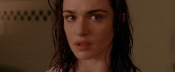 Movie still from “Constantine” (2005), directed by Francis Lawrence – A person with wet hair; Close Up shot, Over the shoulder angle