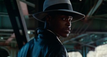 Movie still from “Cooley High” (1975), directed by Michael Schultz – A man wearing a hat and a leather jacket; Close Up shot, Low angle