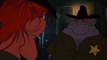 Movie still from “Coonskin” (1974), directed by Ralph Bakshi – A man and a woman are looking at each other; Extreme Close Up shot, Low angle