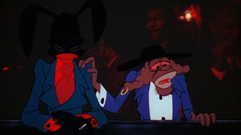 Movie still from “Coonskin” (1974), directed by Ralph Bakshi – A cartoon character with another cartoon character in the background; Close Up shot, Low angle