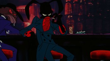 Movie still from “Coonskin” (1974), directed by Ralph Bakshi – A cartoon character is smoking a cigarette in a bar; Medium shot, Over the shoulder angle
