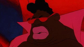 Movie still from “Coonskin” (1974), directed by Ralph Bakshi – An animated gorilla wearing a pair of red sunglasses; Extreme Close Up shot, Low angle