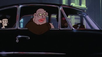 Movie still from “Coonskin” (1974), directed by Ralph Bakshi – An animated character in a black car with a monkey in the passenger seat; Close Up shot, Low angle