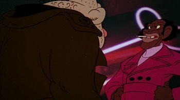 Movie still from “Coonskin” (1974), directed by Ralph Bakshi – View of a cartoon character and another character; Close Up shot, Over the shoulder angle