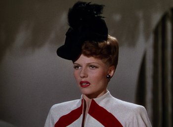 Movie still from “Cover Girl” (1944), directed by Charles Vidor – A person wearing a hat; Close Up shot, Low angle