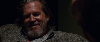 Movie still from “Crazy Heart” (2009), directed by Scott Cooper – A person with long hair and a beard; Close Up shot, Low angle