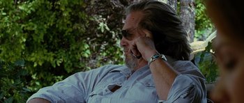 Movie still from “Crazy Heart” (2009), directed by Scott Cooper – A person talking on a cell phone; Close Up shot, Over the shoulder angle
