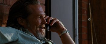 Movie still from “Crazy Heart” (2009), directed by Scott Cooper – An older man talking on a cell phone; Close Up shot, Low angle