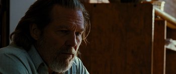 Movie still from “Crazy Heart” (2009), directed by Scott Cooper – An older man with long white hair and a beard; Close Up shot, Low angle