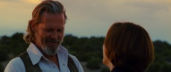 Movie still from “Crazy Heart” (2009), directed by Scott Cooper – A man and a woman talking to each other outside; Close Up shot, Over the shoulder angle
