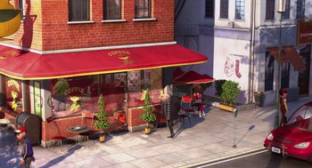 Movie still from “Despicable Me” (2010), directed by Pierre Coffin – An outdoor cafe with tables , chairs , and umbrellas; Extreme Wide shot, Overhead angle