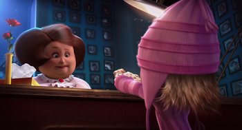 Movie still from “Despicable Me” (2010), directed by Pierre Coffin – A child looking in a mirror with a doll in front; Medium shot, Over the shoulder angle
