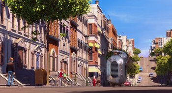 Movie still from “Despicable Me” (2010), directed by Pierre Coffin – A street scene with a large metal object on the side of the road; Extreme Wide shot, Low angle