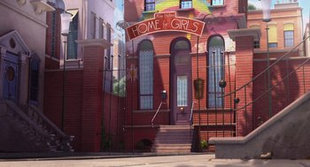 Movie still from “Despicable Me” (2010), directed by Pierre Coffin – A red brick building on a city street; Extreme Wide shot, Low angle