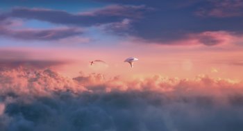 Movie still from “Despicable Me” (2010), directed by Pierre Coffin – Two kites flying in the sky above the clouds; Extreme Wide shot, Low angle