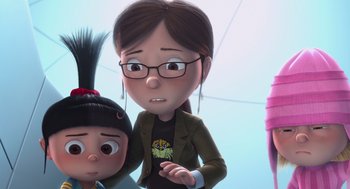 Movie still from “Despicable Me” (2010), directed by Pierre Coffin – An animated woman and a girl are standing next to each other; Medium shot, Over the shoulder angle