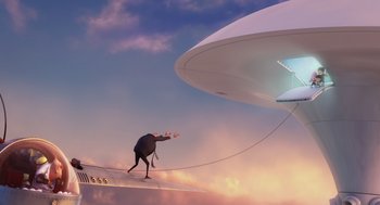Movie still from “Despicable Me” (2010), directed by Pierre Coffin – A man walking across a bridge in front of an airplane; Extreme Wide shot, Low angle