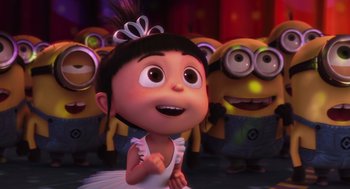 Movie still from “Despicable Me” (2010), directed by Pierre Coffin – A group of minions standing next to each other in a room; Close Up shot, Over the shoulder angle