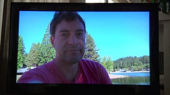Movie still from “Creep” (2014), directed by Patrick Brice – A person on a television screen; Close Up shot, Low angle