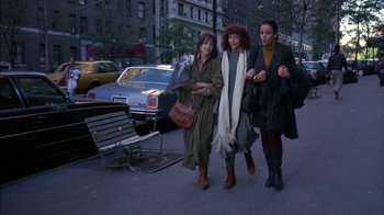 Movie still from “Crossing Delancey” (1988), directed by Joan Micklin Silver – A group of women walking down a sidewalk; Wide shot, Low angle
