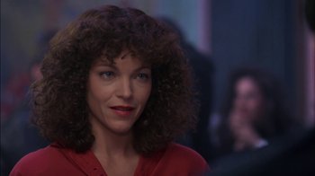 Movie still from “Crossing Delancey” (1988), directed by Joan Micklin Silver – A person wearing a red shirt; Close Up shot, Low angle