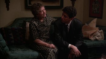 Movie still from “Crossing Delancey” (1988), directed by Joan Micklin Silver – An older woman sitting next to a younger man; Medium shot, High angle