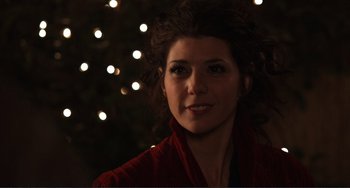 Movie still from “Cyrus” (2010), directed by Jay Duplass – A person wearing a red shirt; Close Up shot, Over the shoulder angle