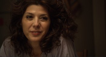 Movie still from “Cyrus” (2010), directed by Jay Duplass – A person with curly hair; Close Up shot, Over the shoulder angle