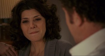 Movie still from “Cyrus” (2010), directed by Jay Duplass – A person looking at a mirror; Close Up shot, Over the shoulder angle