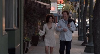 Movie still from “Cyrus” (2010), directed by Jay Duplass – A man and a woman walking down the sidewalk; Medium shot, Over the shoulder angle